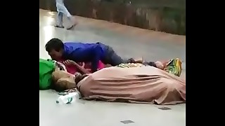 Desi Indian couple having sex in open station infront of crowd
